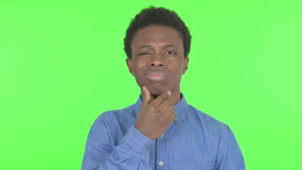 Pensive Casual African Man Thinking New Idea Green Background — Video