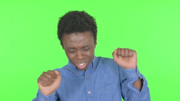 Casual African Man Dancing Joy Green Background — Video