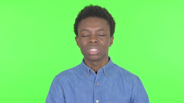 Casual African Man Having Headache Green Background — Video