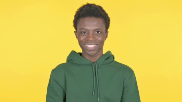 Smiling Casual African Man Yellow Background — Stock videók