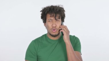 Aggressive Casual African Man Angry on Smartphone on White Background