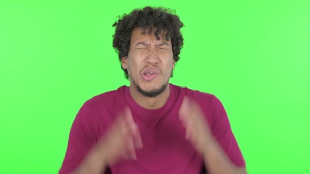 Screaming Casual African Man Going Crazy Green Background — Video