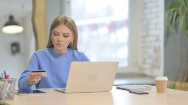 Young Woman Having Successful Online Payment on Laptop