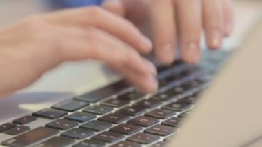 Close up of Female Hand Typing Email on Laptop