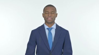 Thumbs Up by Young African Businessman on White Background