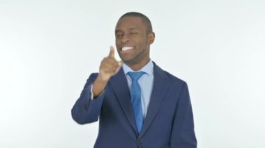 Young African Businessman Pointing at the Camera on White Background