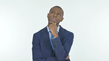 Brainstorming Young African Businessman with an Idea on White Background