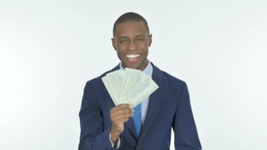 Young African Businessman Showing Dollar Bills on White Background