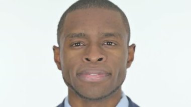 Close Up of Smiling Young African Man Face on White Background