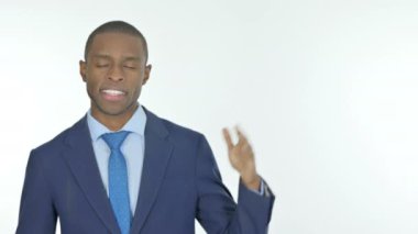 Young African Businessman Showing on Side on White Background
