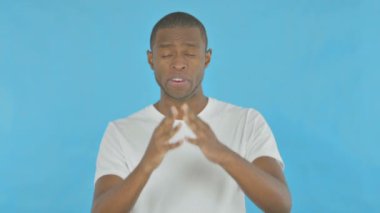 Vlogging Young African Man Talking on Video Chat on Blue Background