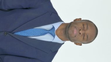 Vertical Video of Approval by Young African Businessman on White Background