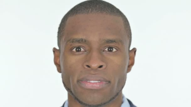 Close Serious Young African Man Face White Background — Video Stock