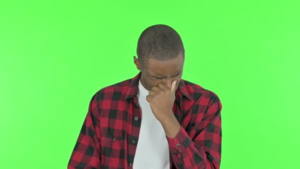 Sad Young African Man Crying Green Background — Stockvideo