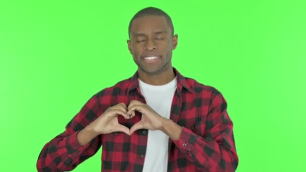Young African Man Showing Heart Love Green Background — 비디오