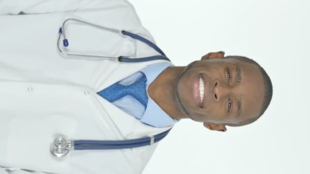 Vertical Video Smiling Young African Doctor White Background — Stockvideo