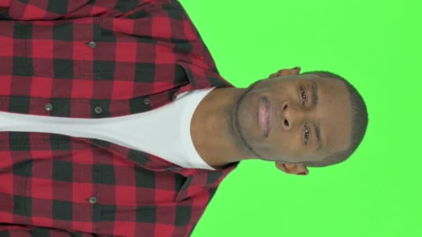 Vertical Video Serious Young African Man Green Background — Wideo stockowe