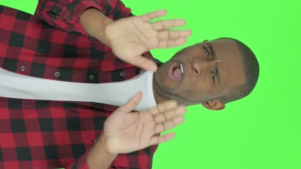 Vertical Video Rejecting Young African Man Denial Green Background — Stockvideo