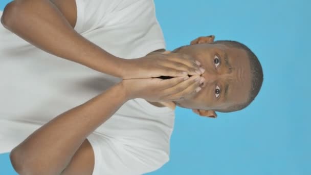 Vertical Video Disappointed Young African Man Blue Background — 비디오