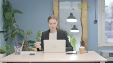 Young Businesswoman Unable to make Online Payment on Laptop