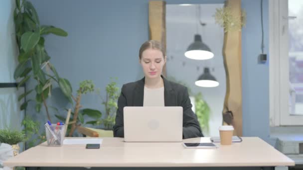 Young Businesswoman Looking Camera While Using Laptop — Stock video