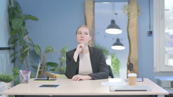 Pensive Young Businesswoman Thinking While Sitting Work — Stockvideo