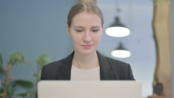 Close Young Businesswoman Smiling Camera While Using Laptop — Stockvideo