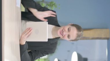 Vertical Video of Online Video Chat on Tablet by Young Businesswoman