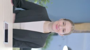Vertical Video of Young Businesswoman with Thumbs Up