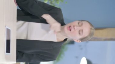 Vertical Video of Young Businesswoman suffering with Cough