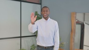 African American Man Waving Hand for Online Video Call