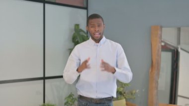 Blogging African American Man Talking on Online Video Call