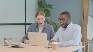 Multiethnic Business People Celebrating Success at Work