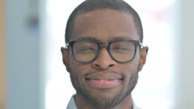 Close Up of Smiling African American Man Face