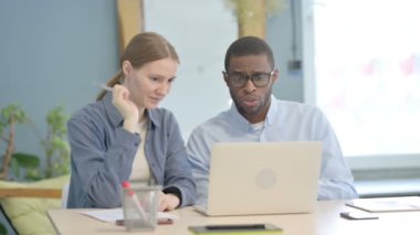 Multiethnic Business People Using Laptop