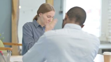 Unsatisfied Angry Woman Fighting with African American Man