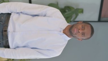 Vertical Video of African American Man showing Thumbs Down