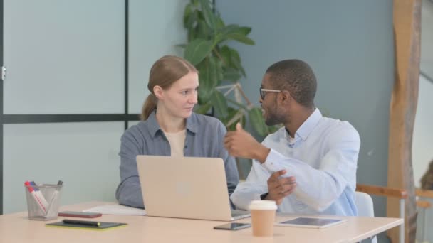 Mixed Race Young Business People Discussing Work Paperwork — Stock video