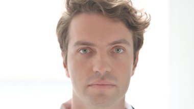 Face Close Up of Serious Casual Young Man