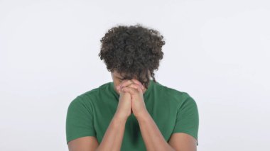 Praying Casual African Man Wishing on White Background