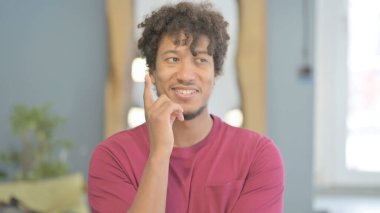 Portrait of Pensive Young African Man Thinking New Plan