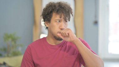 Portrait of Young African Man suffering with Cough