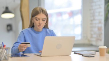 Young Woman Having Successful Online Payment on Laptop