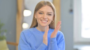 Portrait of Young Woman Clapping, Applauding to Admire