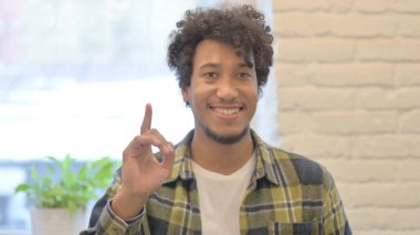 Portrait of Thinking Young African Man Having New Plan