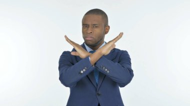Rejecting Young African Businessman on White Background
