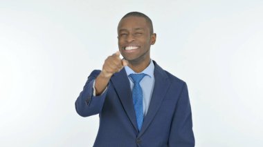 Young African Businessman Pointing at the Camera on White Background
