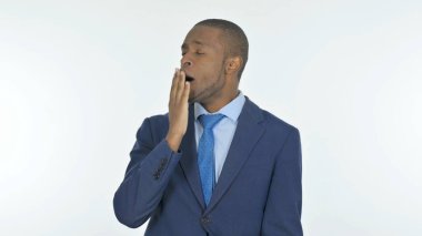 Yawning Young African Businessman on White Background