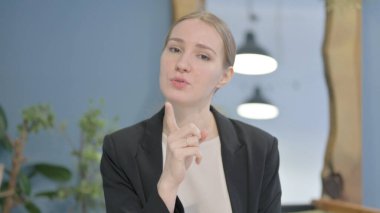 Distraught Young Businesswoman Talking in Anger and Stress