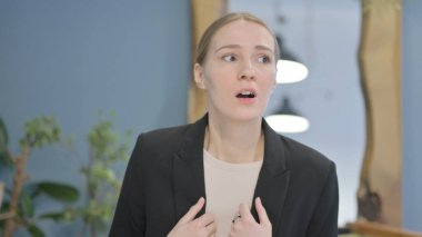 Portrait of Young Businesswoman Feeling Scared and Frightened